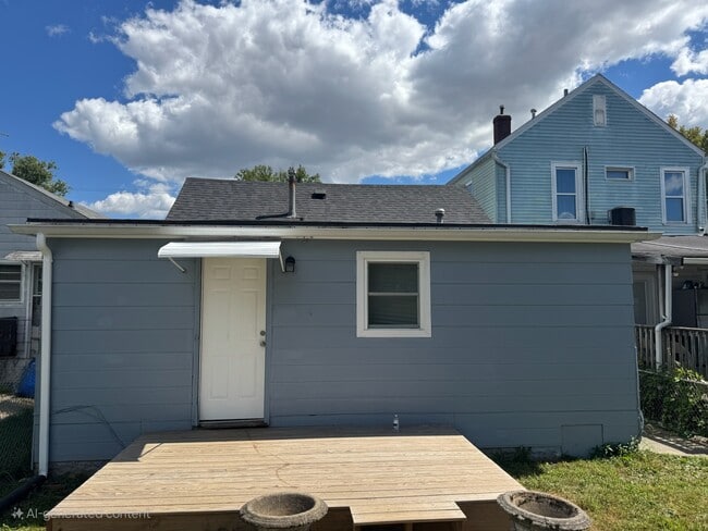 Deck off of back door in the fenced yard - 3348 Bohannon Ave