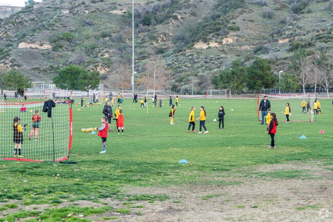 Young teams practice soccer at Central Park in Saugus.