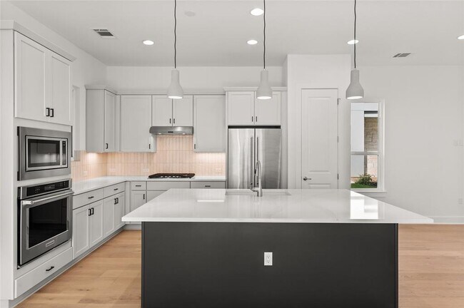 Foto del edificio - 1619 Woodwind Ln
