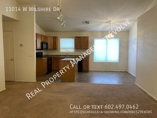 Foto del edificio - 11014 W Wilshire Dr