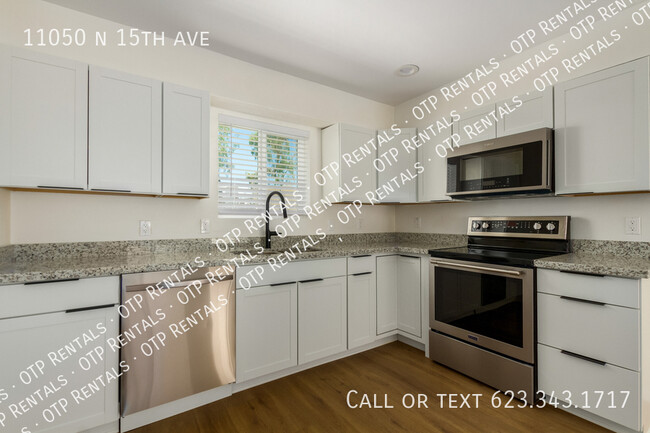 Building Photo - 11050 N 15th Ave