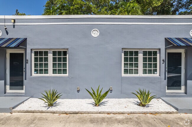 Moderno Slate Gray Fachada - River Studios