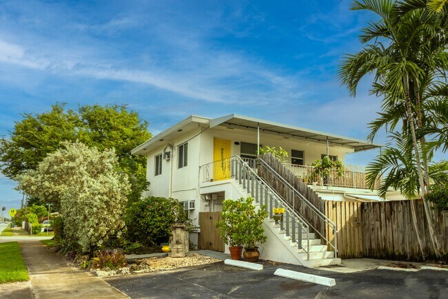 Outside private entrance to apartment top floor and 2 parking spaces - 3670 NE 6th Ave Apartments