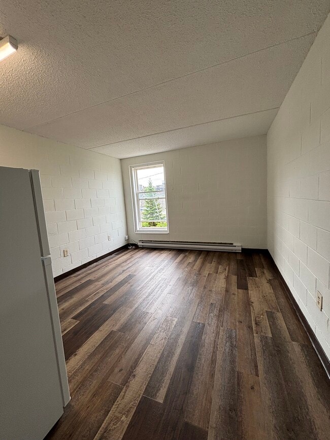 Building Photo - NEWLY RENOVATED - BACHELOR UNITS