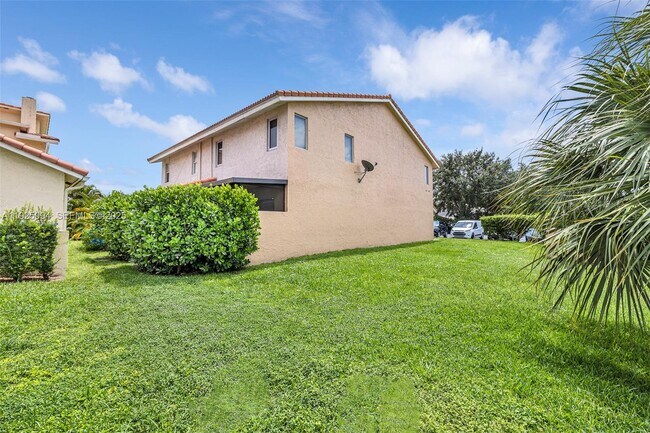 Building Photo - 4299 Coral Springs Dr