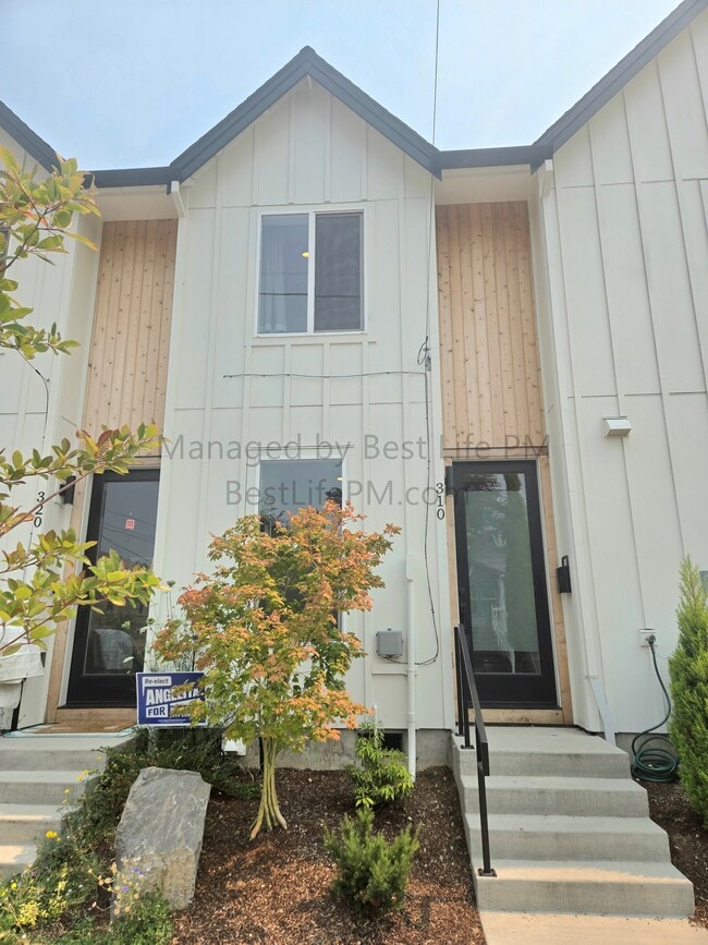 Building Photo - 310 NE 58th Ave