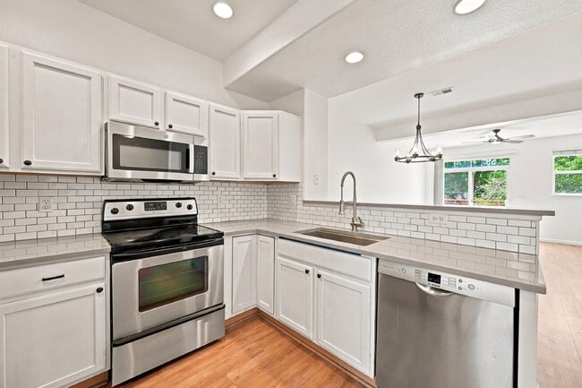 Building Photo - 2,640.95, 2 Bed, 2.5 Bath Townhome in Arvada with Central AC, and attached Garage!