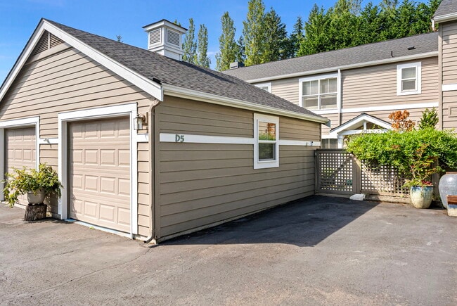 Two parking spaces included in rent; one in garage and one in driveway - 1220 Weaver Rd NW