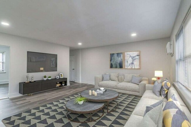 Sala de estar - Tall Tree Village Apartments