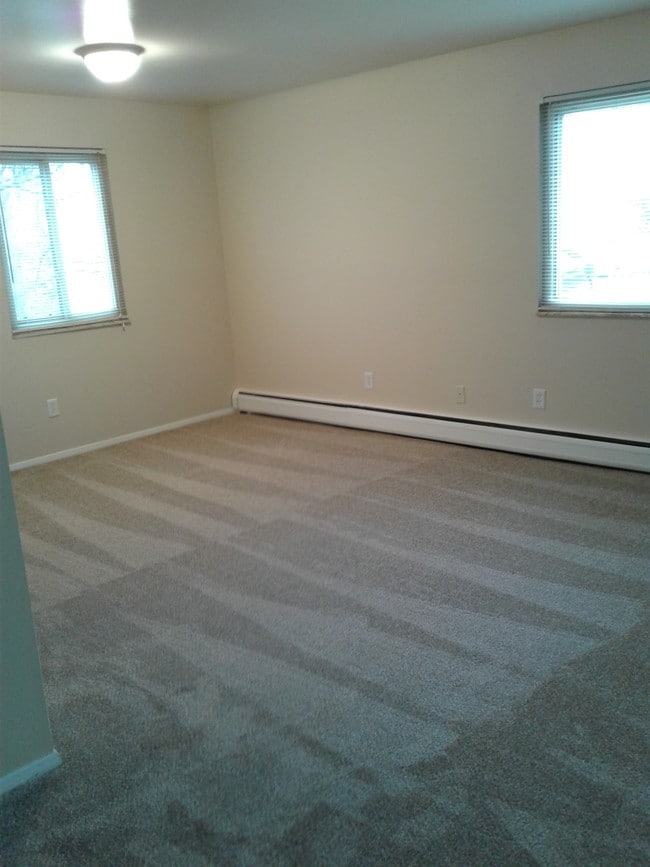 living room and dining room - Twin Gables Apartments