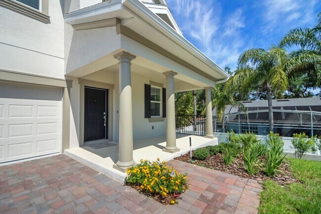 Building Photo - Stunning 4/3 in Gated Dora Parc! Water Views!