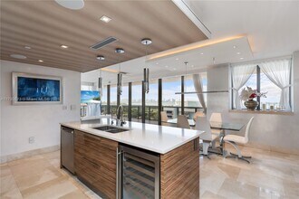 Building Photo - 5875 Collins Ave