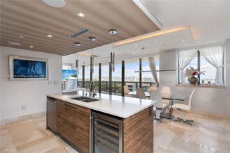 Building Photo - 5875 Collins Ave