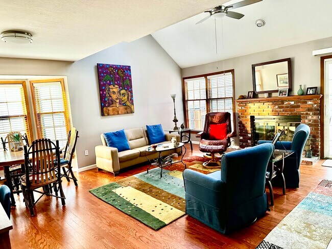 Vaulter great room with fireplace and skylights - 12014 Slater St