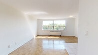 Located at 4979 Bathurst Street, Suite 603 in Toronto's North York neighbourhood, this one-bedroom, one-bathroom unit offers a well-organized and efficiently designed layout across a single floor. The living area features warm parquet wood flooring that extends throughout the main spaces, contributing to a bright and welcoming ambiance, with natural light filtering in from the windows.

The kitchen is a functional highlight, outfitted with crisp white cabinetry reaching toward the ceiling for ample storage, dark countertops, a white subway tile backsplash, and a full suite of stainless steel appliances including a refrigerator, electric range, and built-in microwave. Light tile flooring demarcates the kitchen from the rest of the unit. The open adjacency between the kitchen and living area supports a practical, connected flow.

The bedroom is a comfortable, well-proportioned room with parquet flooring, neutral white walls, and a mirrored sliding-door closet that adds depth and storage convenience. A dedicated closet provides additional storage options within the unit.

The bathroom is finished with classic white subway tile surrounding the combined tub and shower, complemented by a modern vanity with ample under-sink storage, stone-look floor tile, and clean, bright fixtures throughout. The overall aesthetic of the unit is clean, neutral, and move-in ready.