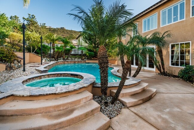 Building Photo - Luxurious home in the Westcliffe Community of San Elijo Approx. 4181sq feet that includes pool/sp...
