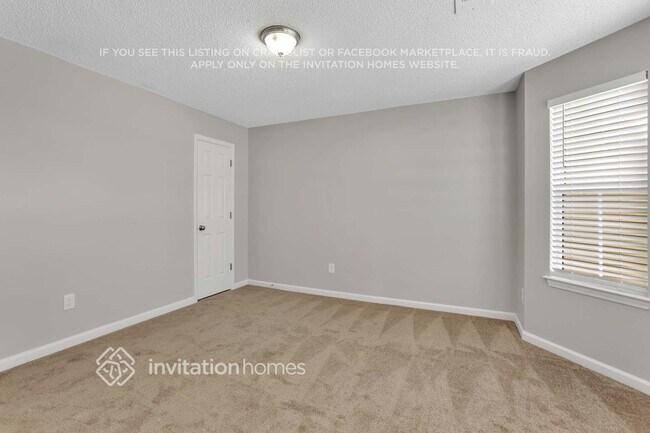 Foto del edificio - 5614 Carriage Walk Way