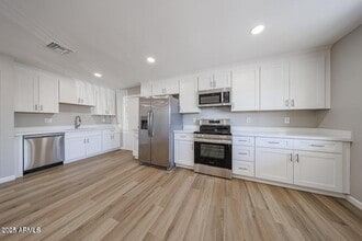 Building Photo - 5336 W Lewis Ave