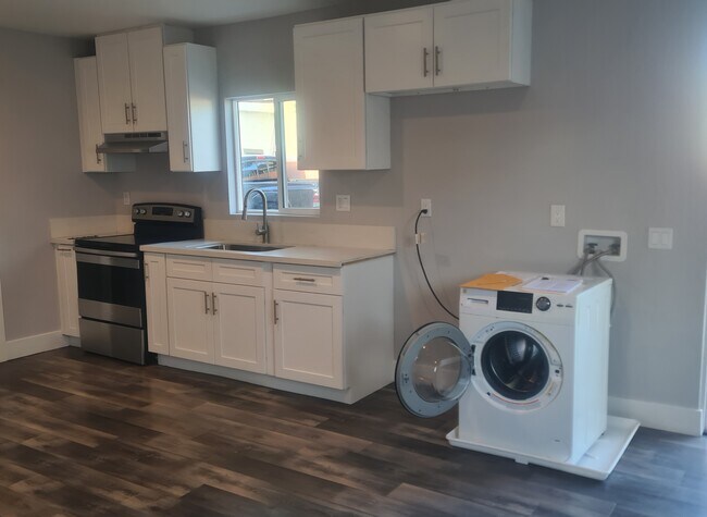 Kitchen with in unit washer dryer combo - 13108 Mercer St