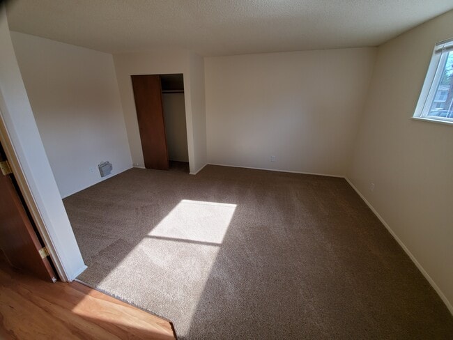 1 BEDROOM: bedroom from bedroom door - Wolfpack Village Apartments