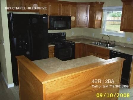 Building Photo - Great 4 bedroom bi-level in D-20!