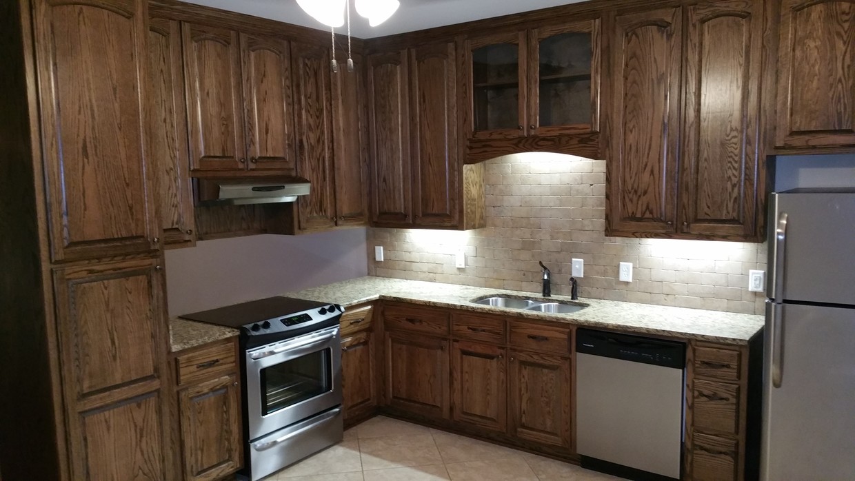 Kitchen features granite counters, stainless - 5174 Co Rd 73
