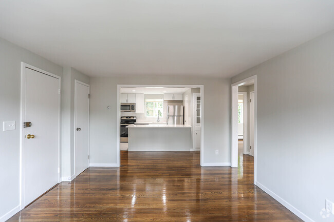 Living room and kitchen. - Emerson Arms Apartments