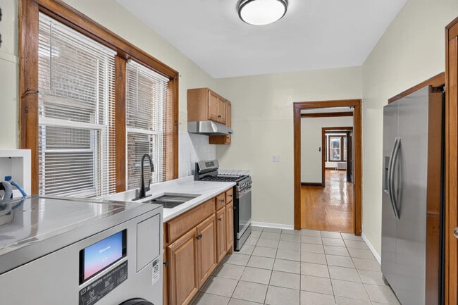 Foto del edificio - 7324 S Maplewood Ave