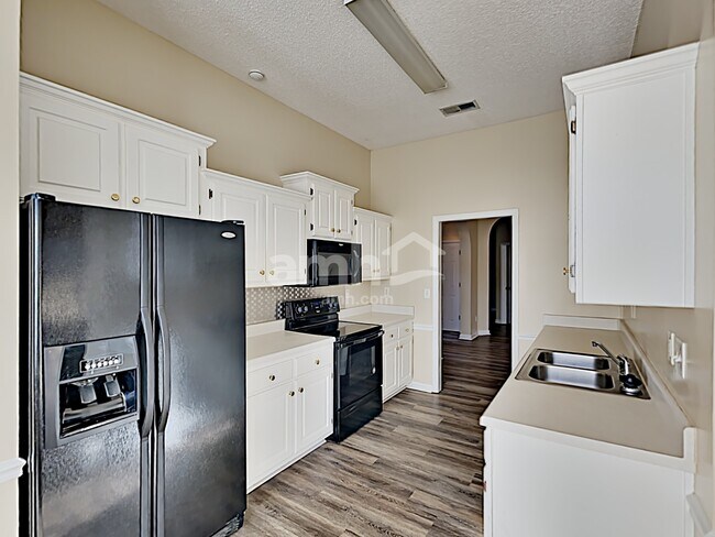 Foto del edificio - 4946 Rivercrest Ln