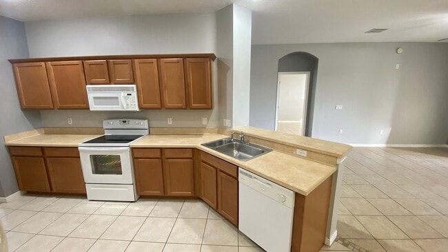 Building Photo - Four Bedroom, Three Bath Single Family Hom...