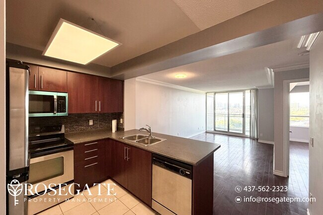 Photo du bâtiment - Modern 1-Bedroom + Den, 1-Bath Condo in Ri...