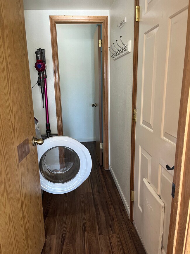 hallway to 1/2 bath with laundry and garge entry - 2619 15th Ave