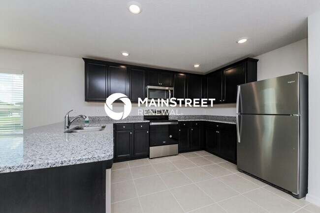 Foto del edificio - 4 Bedroom Pet-Friendly Home in Mascotte, FL with Main Street Renewal