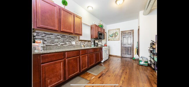Building Photo - 4510 S Lowe Ave