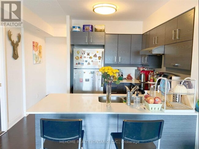 Photo du bâtiment - 1 Uptown Dr