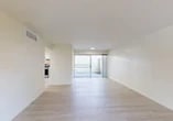 Located at 1159 Stratford Cir in Stockton, CA, this single-story, 3-bedroom, 2-bathroom home offers a clean, modern aesthetic throughout. Light wood-style flooring flows seamlessly across every room, creating a bright and cohesive feel. The open living room is bathed in natural light, anchored by large sliding glass doors that lead to a private outdoor patio area with greenery. A ceiling fan with integrated lighting adds comfort to one of the well-proportioned bedrooms, which also features a wide window overlooking lush outdoor trees. The kitchen is thoughtfully designed with white upper cabinetry, grey lower cabinetry, stainless steel appliances including a refrigerator, electric range, and dishwasher, and a clean white countertop. An adjacent dining or flex area showcases open wood shelving and additional sliding door access to the patio. The bathrooms are finished with marble-style tiled shower enclosures, light wood-style flooring, and sleek matte black hardware accents. A connecting hallway ties the layout together efficiently. The home's warm, neutral palette and abundant natural light lend a welcoming and airy ambiance throughout.