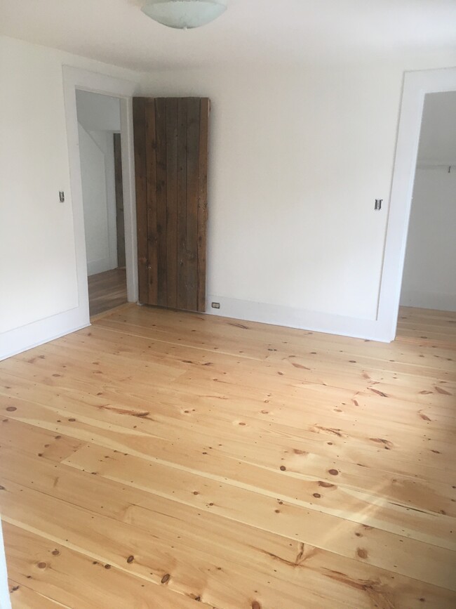 Main bedroom new pine floors - 468 Union St