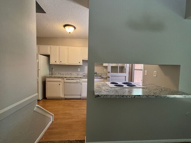 Building Photo - 2-story townhome with 1-car attached garage!