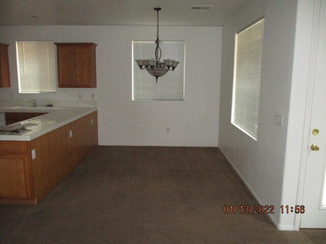 Foto del edificio - 7459 Poppy Hills Ct