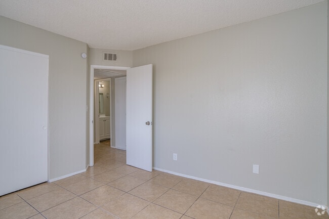 2BR, 1.5BA - 955SF - Primary Bedroom - Woodridge Manor