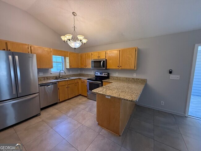 Foto del edificio - 115 Lake Wisteria Ct