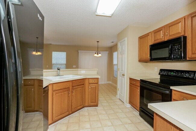 Foto del edificio - 6581 Long Nook Ln