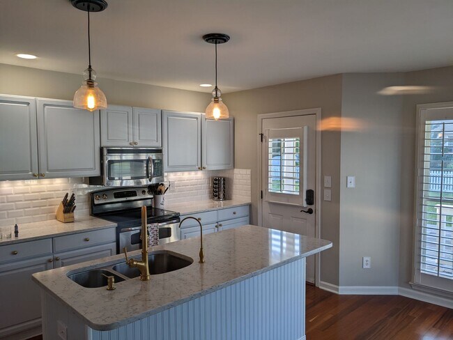 Building Photo - Blue Heron Bay Home Available Now!