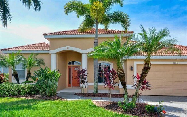 Building Photo - 1944 Coconut Palm Cir