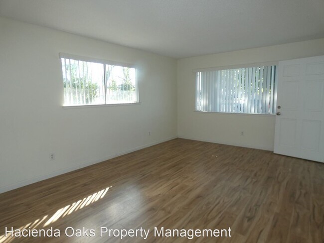 Foto del edificio - 4 br, 1.5 bath House - 1568 S. Walnut Avenue