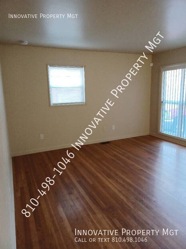 Building Photo - Cozy Up in this 3-bedroom home with wood f...
