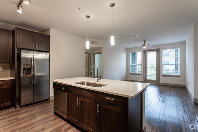 2BR,2BA W/DEN - 1303SF - THE VILLA - KITCHEN/LIVING AREA - The Callie