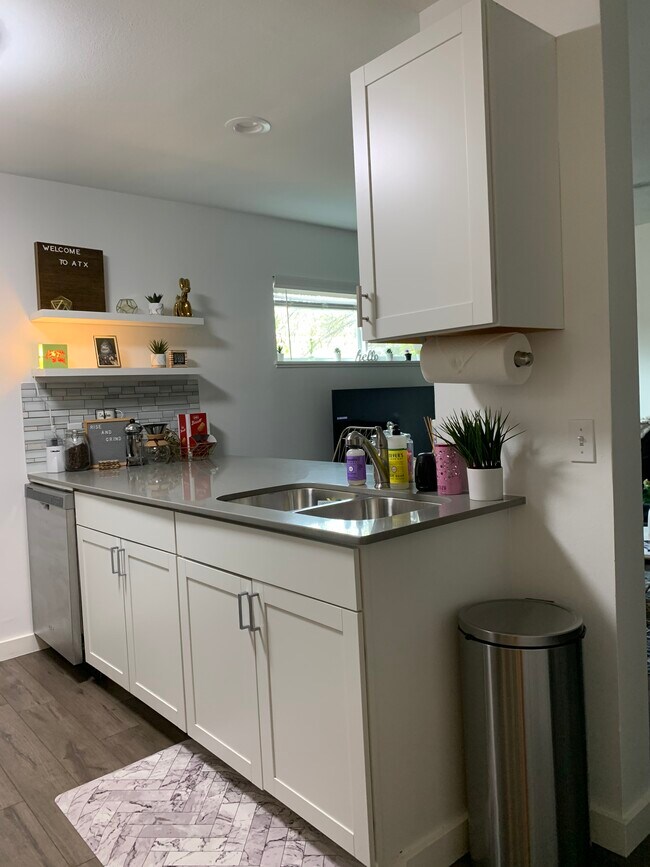 Quartz counters and electric dishwasher. - 1300 Newning Ave