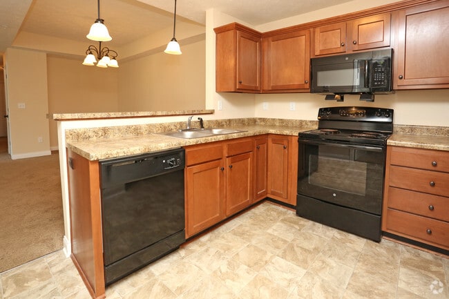 3 BR, 2BA - 1,373 SF - Kitchen - Academy Park Apartments