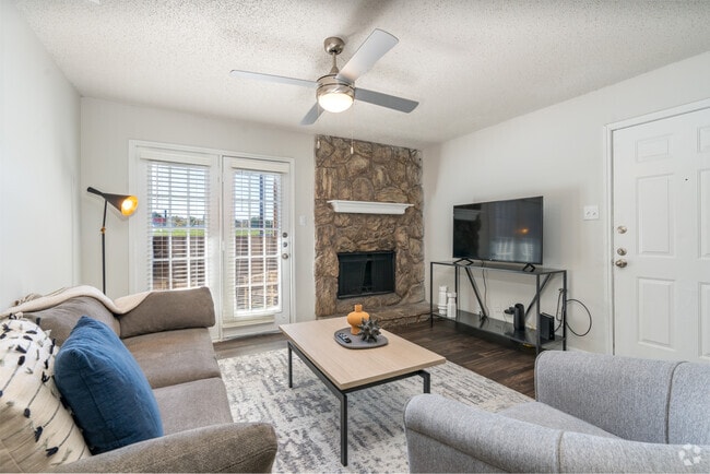 2BR, 1BA - 895SF - Living Room - Cozy Denton, TX Apartment Homes